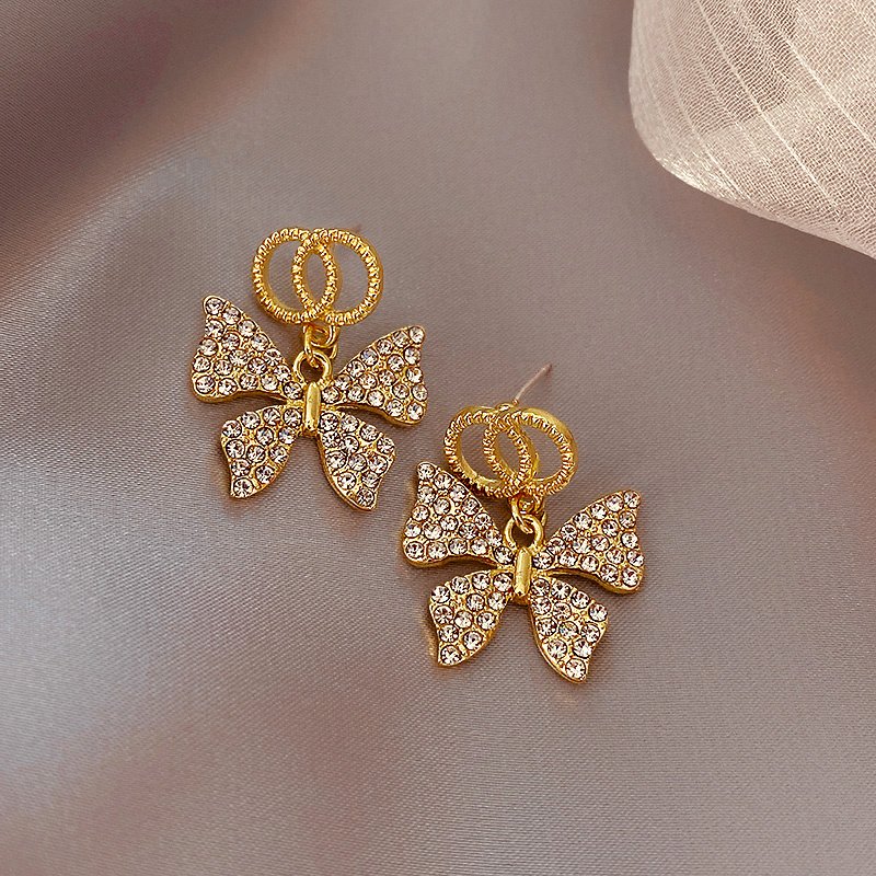 Stone bow earrings